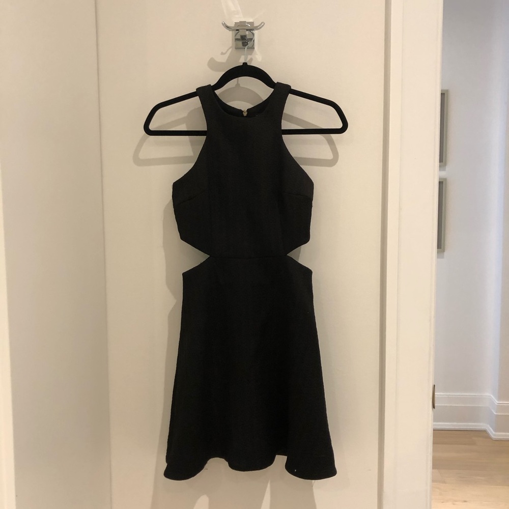 Club Monaco dress with side cut-outs. Black sz 00